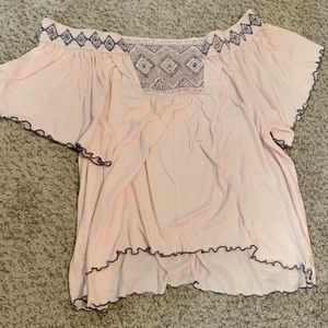 Of the shoulder shirt